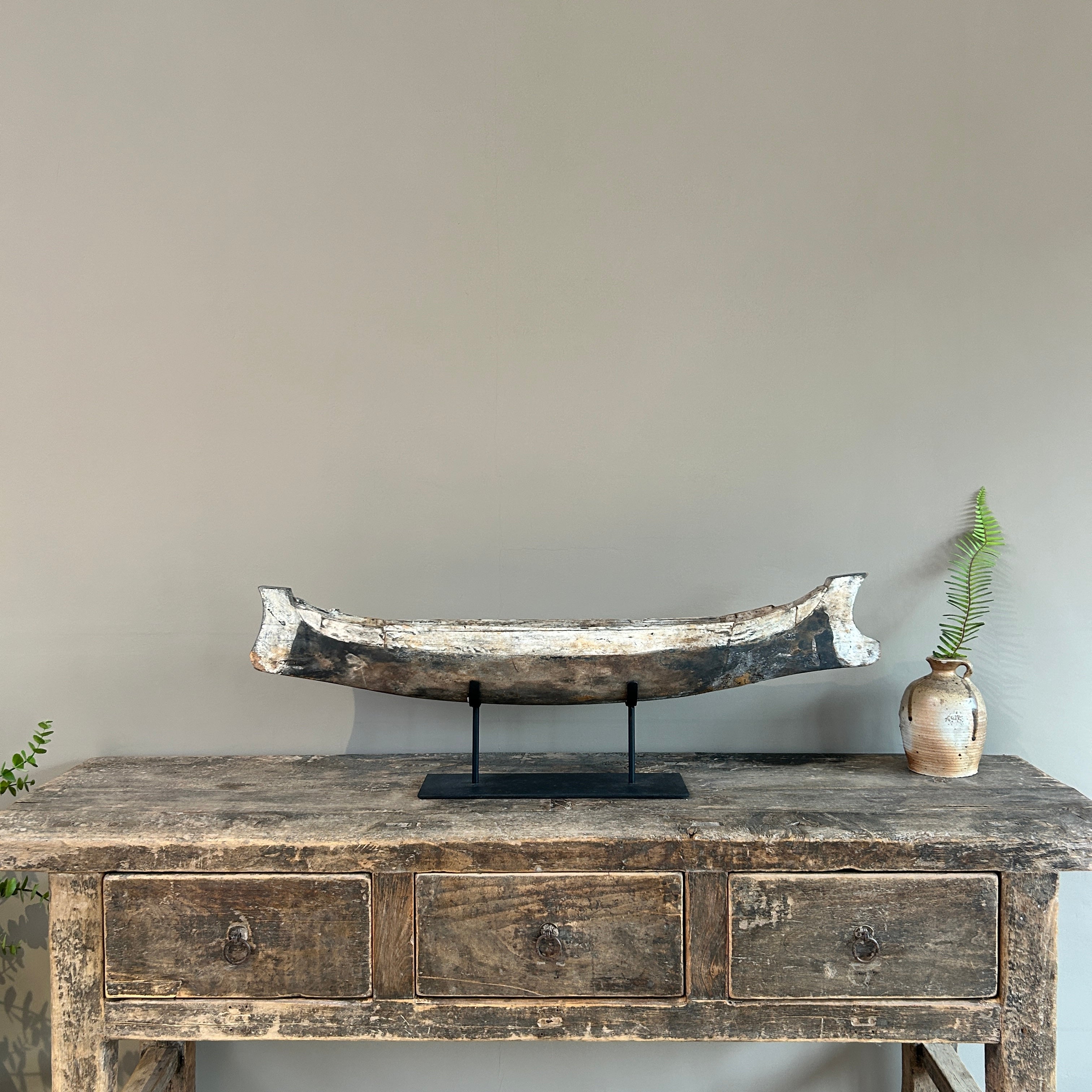 Antique wooden boat on stand | Krishna