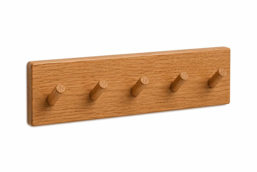 Wooden wall hook with five hooks on a white background
